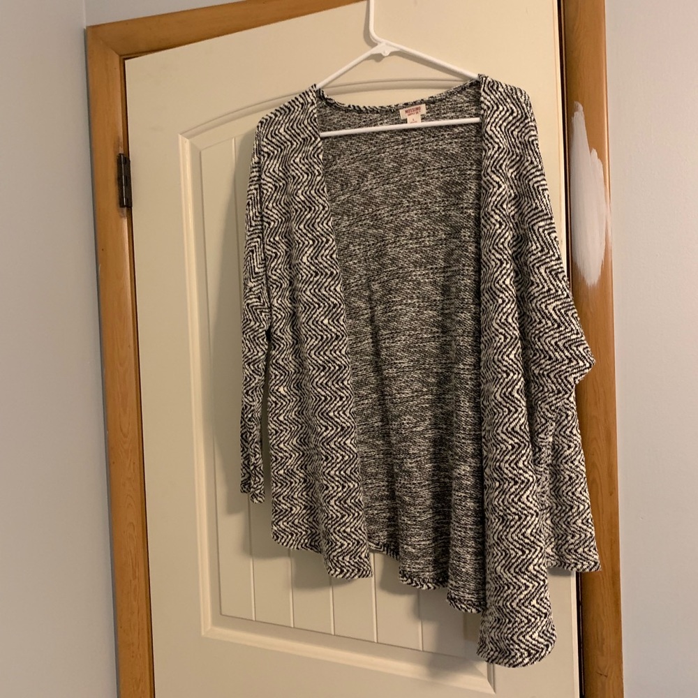 Black and white open sweater